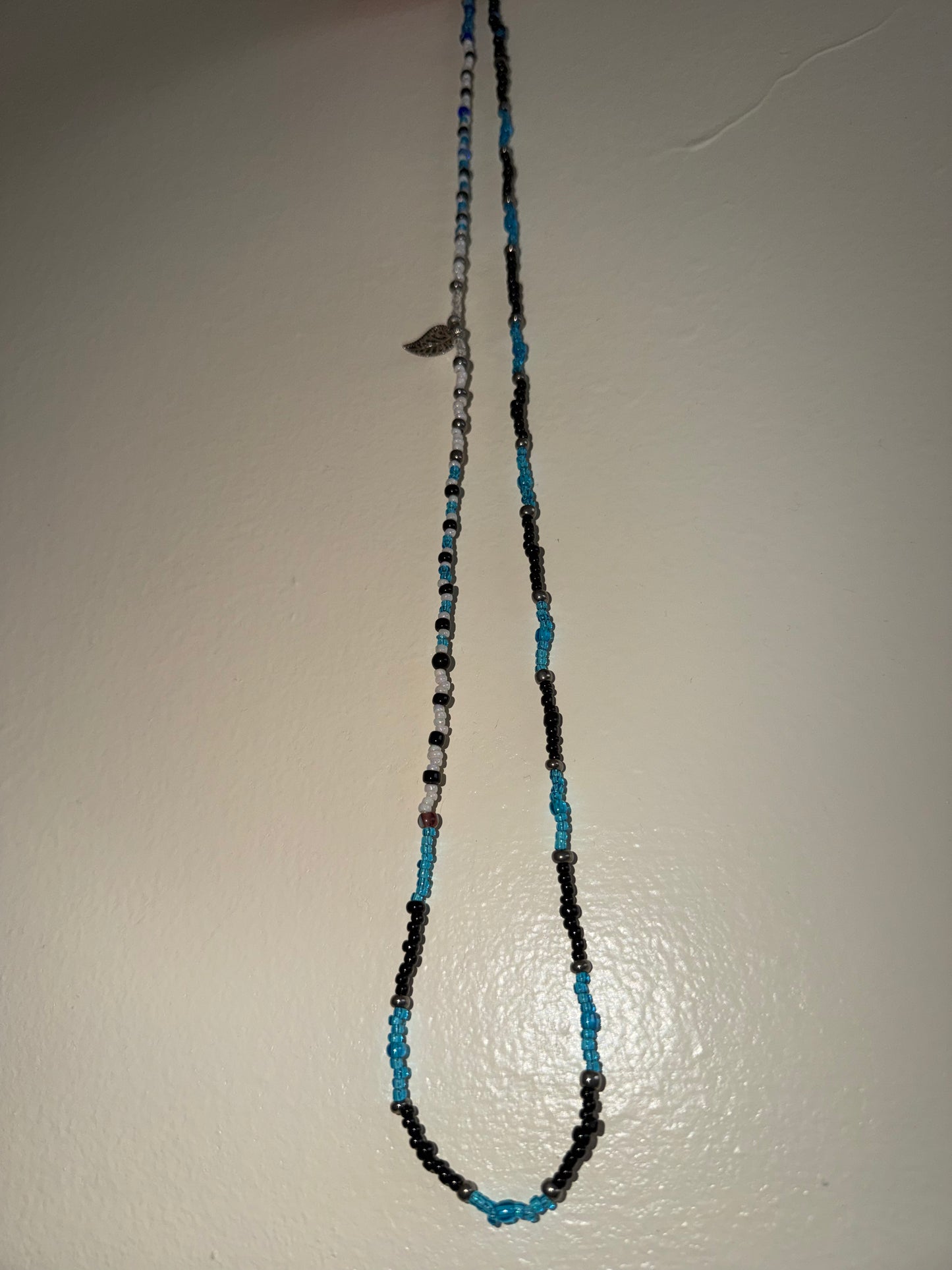 Feather waistbead 33”