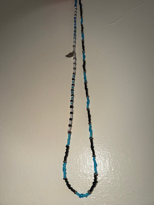 Feather waistbead 33”